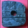Relief votif perforé de Doudou